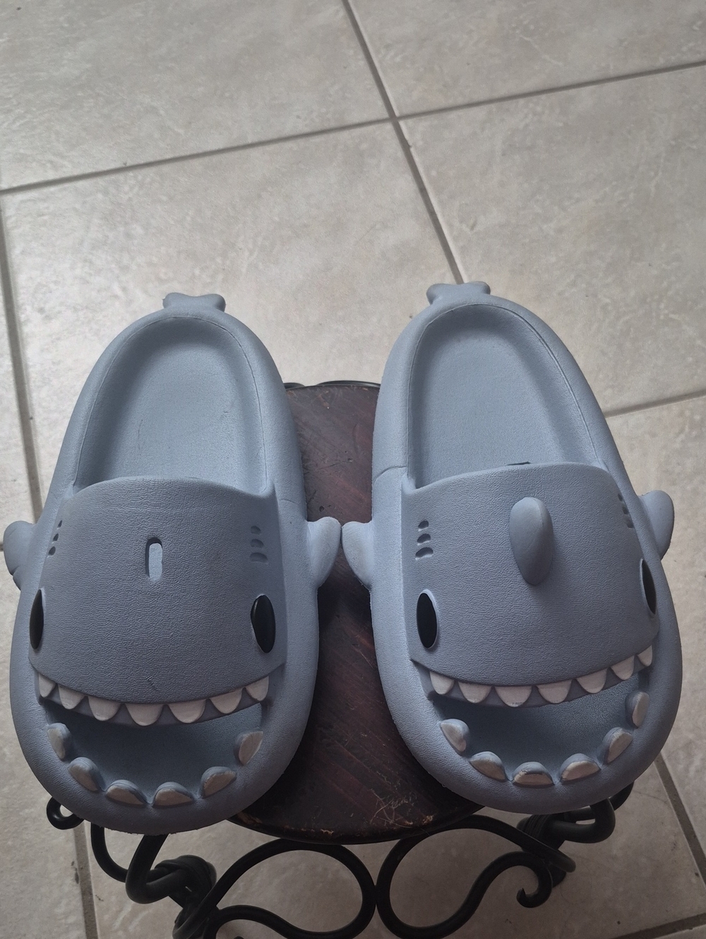 EVA cloud shark slides feature a playful cartoon shark design with jagged teeth